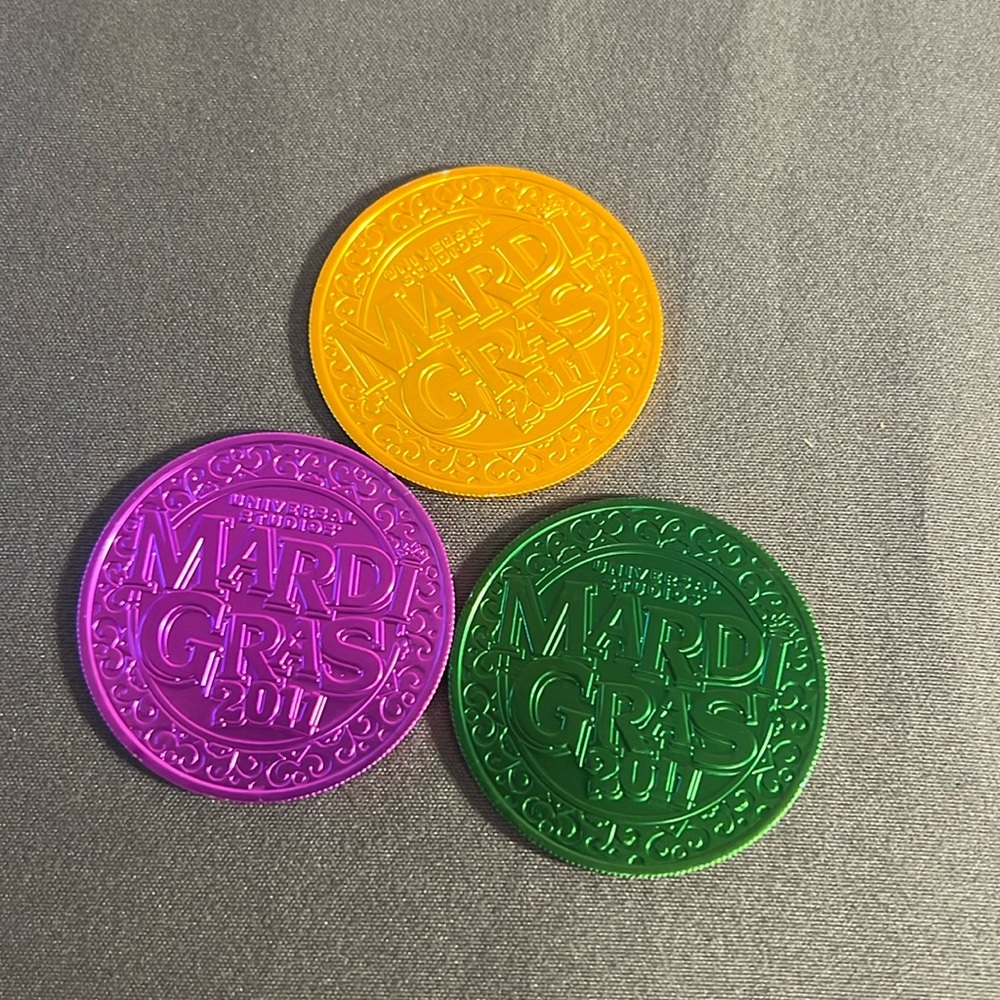 Universal studios Mardi Gras 2011 wind earth fire water token coins